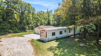 This home is ready for new owners to move right in.  Located on on The Falls At Barber Creek in Michigan - for sale on GolfHomes.com, golf home, golf lot
