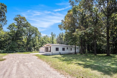 This home is ready for new owners to move right in.  Located on on The Falls At Barber Creek in Michigan - for sale on GolfHomes.com, golf home, golf lot