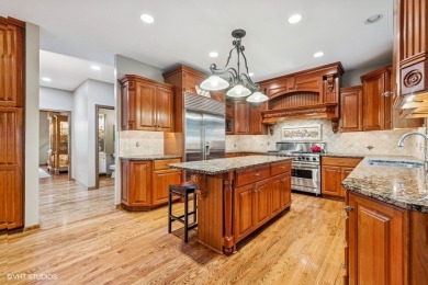This EXQUISITE all-brick home is nestled on Signature Hole #3 of on Royal Fox Country Club in Illinois - for sale on GolfHomes.com, golf home, golf lot