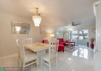 This charming 2-bedroom, 2-bathroom corner condo is in the on Oriole Golf and Tennis Club in Florida - for sale on GolfHomes.com, golf home, golf lot