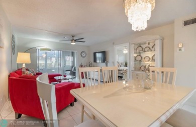 This charming 2-bedroom, 2-bathroom corner condo is in the on Oriole Golf and Tennis Club in Florida - for sale on GolfHomes.com, golf home, golf lot