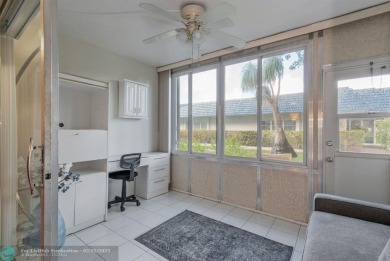 This charming 2-bedroom, 2-bathroom corner condo is in the on Oriole Golf and Tennis Club in Florida - for sale on GolfHomes.com, golf home, golf lot