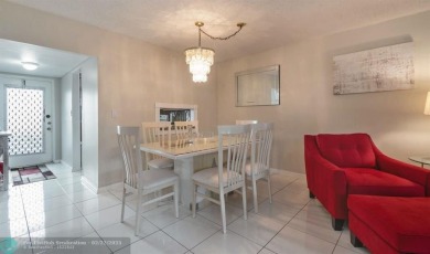 This charming 2-bedroom, 2-bathroom corner condo is in the on Oriole Golf and Tennis Club in Florida - for sale on GolfHomes.com, golf home, golf lot