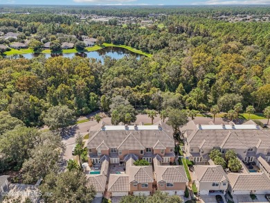 Stunning Townhome nestled in the center of  Palencia Golf on The Palencia Club in Florida - for sale on GolfHomes.com, golf home, golf lot