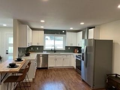 Welcome home! This beautifully remodeled 3-bedroom, 2 bath home on East Lake Golf Club in Georgia - for sale on GolfHomes.com, golf home, golf lot