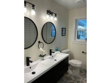 Welcome home! This beautifully remodeled 3-bedroom, 2 bath home on East Lake Golf Club in Georgia - for sale on GolfHomes.com, golf home, golf lot