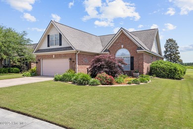 Experience the tranquility of Castle Bay's Scottish Links-style on Castle Bay Golf and Country Club in North Carolina - for sale on GolfHomes.com, golf home, golf lot