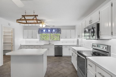 Welcome to 2365 Tumbleweed Drive, located in the heart of Holley on The Club At Hidden Creek in Florida - for sale on GolfHomes.com, golf home, golf lot