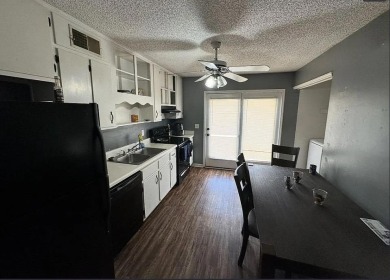 Move-in ready, affordable condo sitting directly on the Hillman on Hilaman Park Golf Course in Florida - for sale on GolfHomes.com, golf home, golf lot