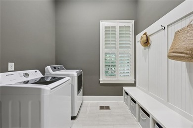 An architectural masterpiece in a gated community, on the 5th on Echelon Golf Club in Georgia - for sale on GolfHomes.com, golf home, golf lot