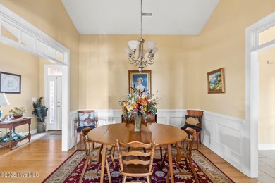 Experience the tranquility of Castle Bay's Scottish Links-style on Castle Bay Golf and Country Club in North Carolina - for sale on GolfHomes.com, golf home, golf lot