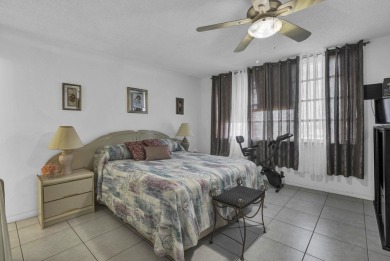 Don't miss this opportunity to own a top-floor 2-bedroom on Grande Oaks Golf Club in Florida - for sale on GolfHomes.com, golf home, golf lot