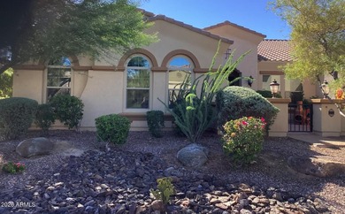 Stunning, barely lived-in home designed for seamless on Estrella Mountain Ranch Golf Course in Arizona - for sale on GolfHomes.com, golf home, golf lot