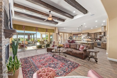 Stunning, barely lived-in home designed for seamless on Estrella Mountain Ranch Golf Course in Arizona - for sale on GolfHomes.com, golf home, golf lot