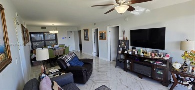 An updated 2 bed/2 bath with serene water/golf course views on Turnberry Isle Resort and Club in Florida - for sale on GolfHomes.com, golf home, golf lot