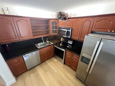 Top floor, corner unit.. Enclosed balcony with brand new Impact on  in Florida - for sale on GolfHomes.com, golf home, golf lot