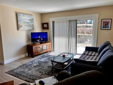 NOT in a 55+ community, this charming updated 2 bedroom, 2 bath on Bayou Golf Club in Florida - for sale on GolfHomes.com, golf home, golf lot