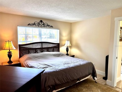 NOT in a 55+ community, this charming updated 2 bedroom, 2 bath on Bayou Golf Club in Florida - for sale on GolfHomes.com, golf home, golf lot