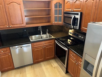 Top floor, corner unit.. Enclosed balcony with brand new Impact on Boca Dunes Golf and Country Club in Florida - for sale on GolfHomes.com, golf home, golf lot