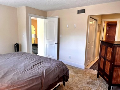 NOT in a 55+ community, this charming updated 2 bedroom, 2 bath on Bayou Golf Club in Florida - for sale on GolfHomes.com, golf home, golf lot