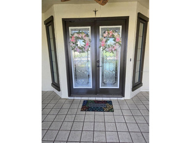 Sought out Villa located on a tranquil and serene pond front lot on Highland Lakes Executive Golf Course in Florida - for sale on GolfHomes.com, golf home, golf lot