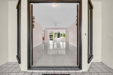 Sought out Villa located on a tranquil and serene pond front lot on Highland Lakes Executive Golf Course in Florida - for sale on GolfHomes.com, golf home, golf lot