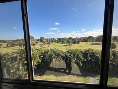 Top floor, corner unit.. Enclosed balcony with brand new Impact on  in Florida - for sale on GolfHomes.com, golf home, golf lot