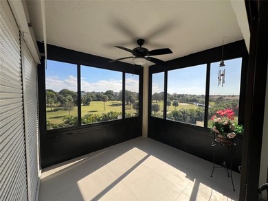Top floor, corner unit.. Enclosed balcony with brand new Impact on Boca Dunes Golf and Country Club in Florida - for sale on GolfHomes.com, golf home, golf lot