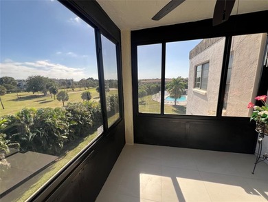 Top floor, corner unit.. Enclosed balcony with brand new Impact on Boca Dunes Golf and Country Club in Florida - for sale on GolfHomes.com, golf home, golf lot