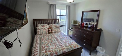 An updated 2 bed/2 bath with serene water/golf course views on Turnberry Isle Resort and Club in Florida - for sale on GolfHomes.com, golf home, golf lot