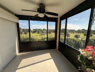 Top floor, corner unit.. Enclosed balcony with brand new Impact on Boca Dunes Golf and Country Club in Florida - for sale on GolfHomes.com, golf home, golf lot