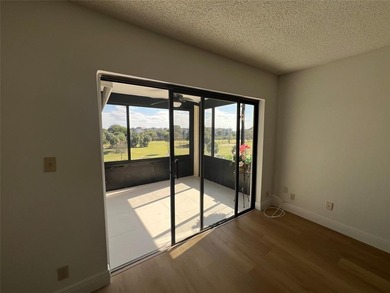 Top floor, corner unit.. Enclosed balcony with brand new Impact on Boca Dunes Golf and Country Club in Florida - for sale on GolfHomes.com, golf home, golf lot