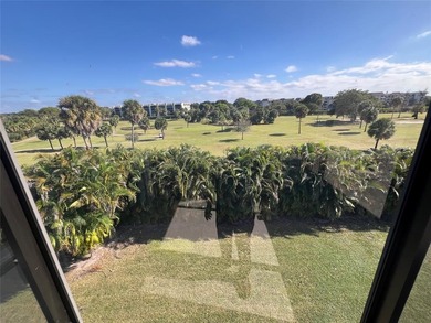 Top floor, corner unit.. Enclosed balcony with brand new Impact on Boca Dunes Golf and Country Club in Florida - for sale on GolfHomes.com, golf home, golf lot