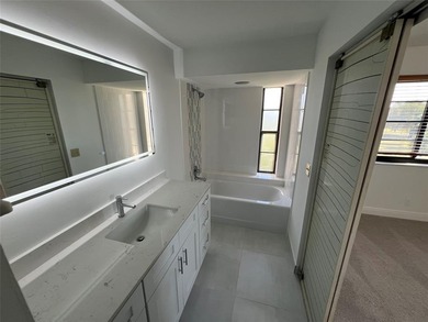 Top floor, corner unit.. Enclosed balcony with brand new Impact on Boca Dunes Golf and Country Club in Florida - for sale on GolfHomes.com, golf home, golf lot