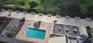 An updated 2 bed/2 bath with serene water/golf course views on Turnberry Isle Resort and Club in Florida - for sale on GolfHomes.com, golf home, golf lot