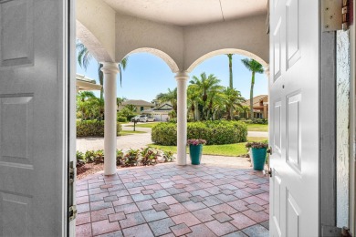 This beautifully appointed home, located in the highly desirable on Binks Forest Golf Club in Florida - for sale on GolfHomes.com, golf home, golf lot