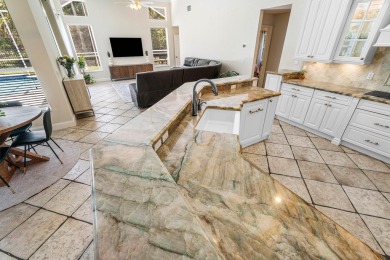 This beautifully appointed home, located in the highly desirable on Binks Forest Golf Club in Florida - for sale on GolfHomes.com, golf home, golf lot