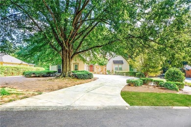 Welcome to a perfectly situated home in the heart of Windward on The Golf Club of Georgia in Georgia - for sale on GolfHomes.com, golf home, golf lot