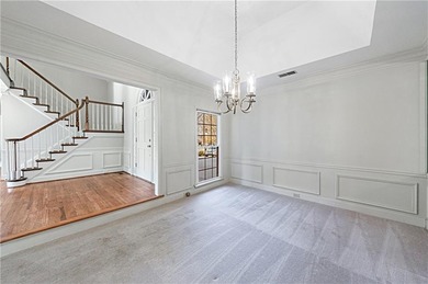 Welcome to a perfectly situated home in the heart of Windward on The Golf Club of Georgia in Georgia - for sale on GolfHomes.com, golf home, golf lot