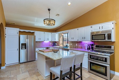 Stunning Santa Fe Estate Overlooking Lake Havasu Golf Course! on London Bridge Golf Course in Arizona - for sale on GolfHomes.com, golf home, golf lot