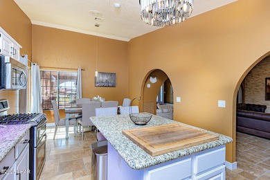 Stunning Santa Fe Estate Overlooking Lake Havasu Golf Course! on London Bridge Golf Course in Arizona - for sale on GolfHomes.com, golf home, golf lot