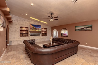 Stunning Santa Fe Estate Overlooking Lake Havasu Golf Course! on London Bridge Golf Course in Arizona - for sale on GolfHomes.com, golf home, golf lot