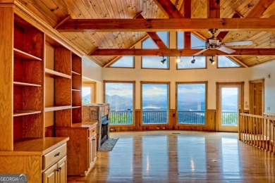 Breathtaking views abound from this 3-bedroom, 3.5-bath home on on Chatuge Shores Golf Course in North Carolina - for sale on GolfHomes.com, golf home, golf lot