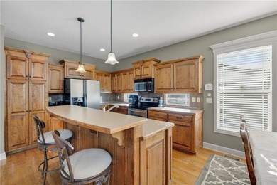 Well-maintained reverse 1.5-story single-family home in the on Golf Club of Creekmoor in Missouri - for sale on GolfHomes.com, golf home, golf lot