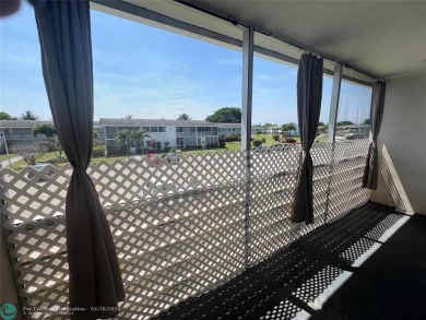CUTE AS A BUTTON! CHARMING SECOND FLOOR 1 BEDROOM, 1 BATH CONDO on Hillsboro Pines Golf in Florida - for sale on GolfHomes.com, golf home, golf lot
