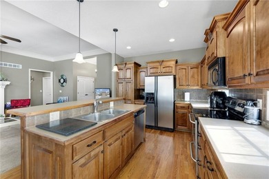 Well-maintained reverse 1.5-story single-family home in the on Golf Club of Creekmoor in Missouri - for sale on GolfHomes.com, golf home, golf lot