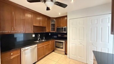 Spacious Corner  Unit townhouse features 4 bedrooms with 2 and on Davie Golf Club in Florida - for sale on GolfHomes.com, golf home, golf lot