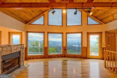 Breathtaking views abound from this 3-bedroom, 3.5-bath home on on Chatuge Shores Golf Course in North Carolina - for sale on GolfHomes.com, golf home, golf lot