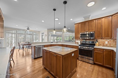 Step into this stunning Zaytoun-Raines custom home and you'll be on Cypress Landing Golf Club in North Carolina - for sale on GolfHomes.com, golf home, golf lot