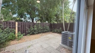 Spacious Corner  Unit townhouse features 4 bedrooms with 2 and on Davie Golf Club in Florida - for sale on GolfHomes.com, golf home, golf lot